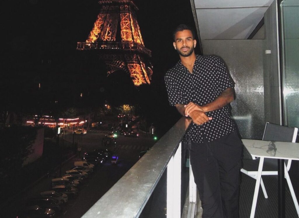 Sumit Nagal posing with the Eiffel Tower during the 2024 Paris Olympics